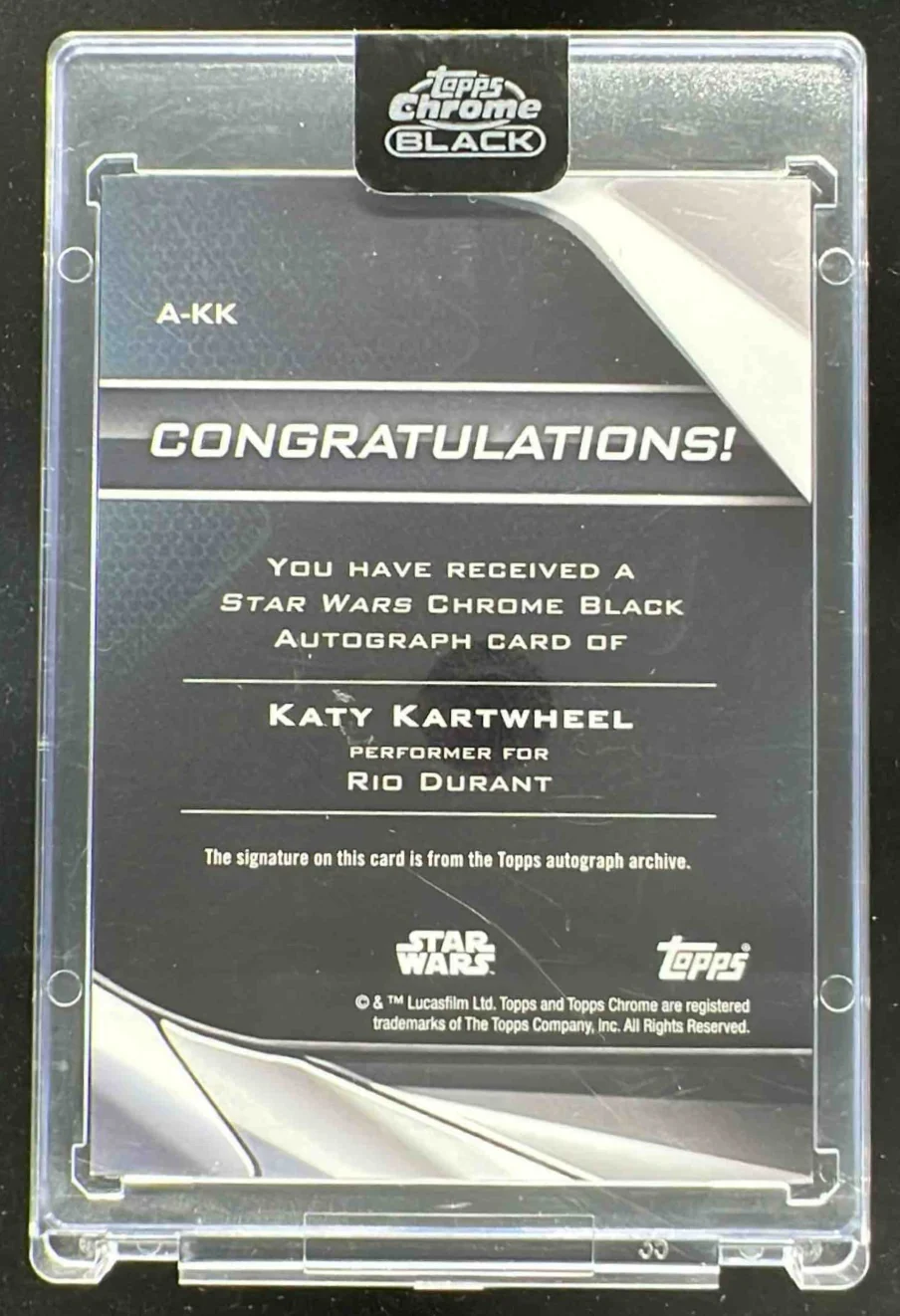 2024 Topps Chrome Black Star Wars Orange Refractor #A-KK Katy Kartwheel Auto /25 - Image 2