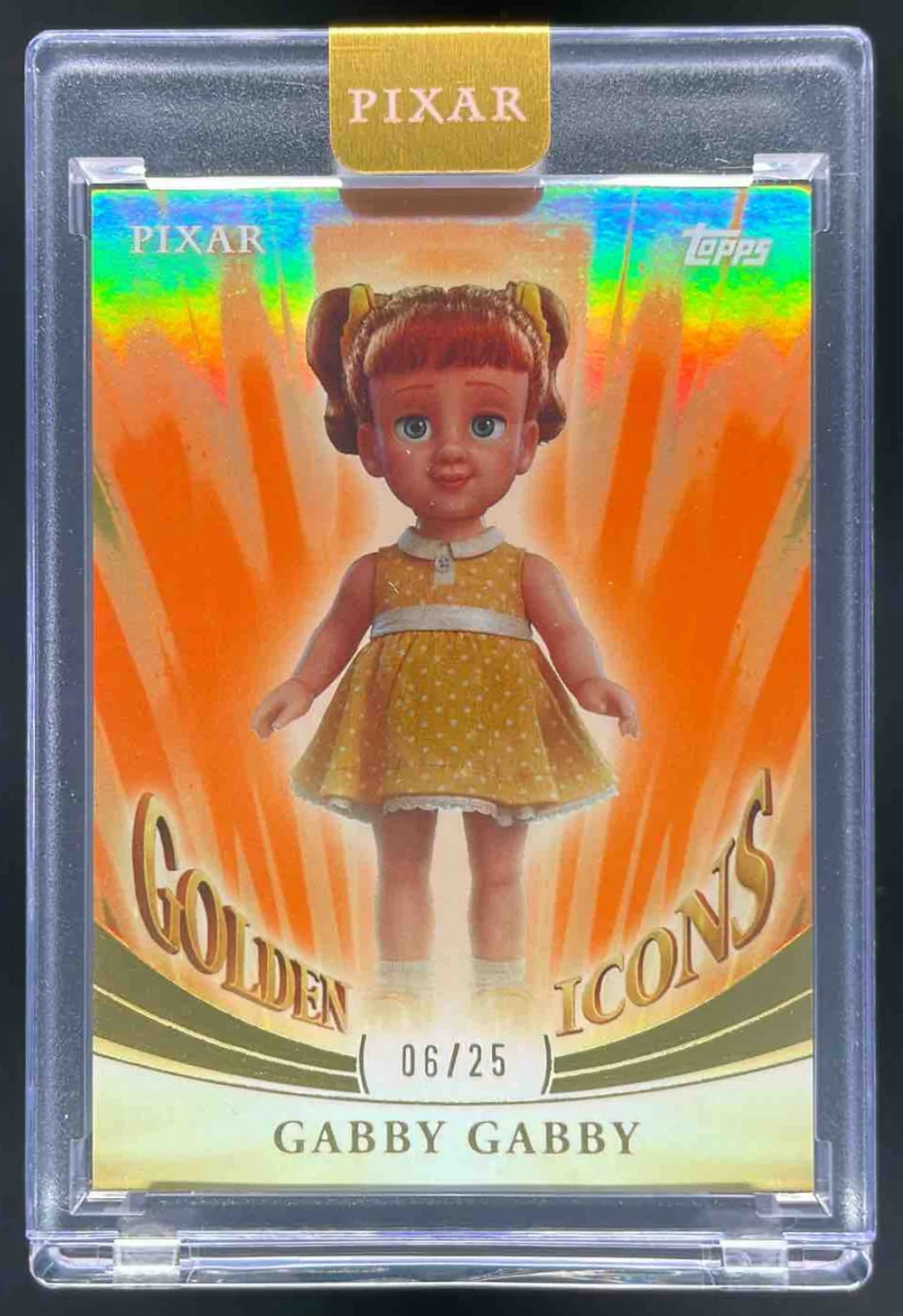 2025 Topps Pixar Gold Golden Icons Encased Orange #GI-76 Gabby /25