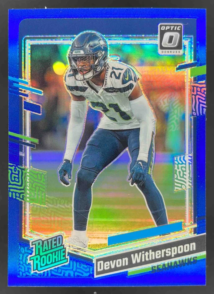 2023 Panini Donruss Optic Blue Prizm #292 Devon Witherspoon RC Rated Rookie /199
